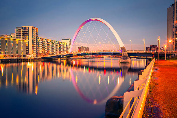 The Finnieston Bridge over the River Clyde in Glasgow - also known as the Clyde Arc and, less formally, the "Squinty Bridge" - at night.